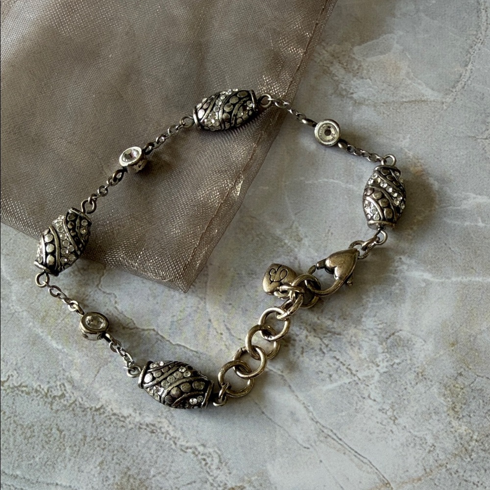 Elegant Silver Bracelet with Intricate Detailing
